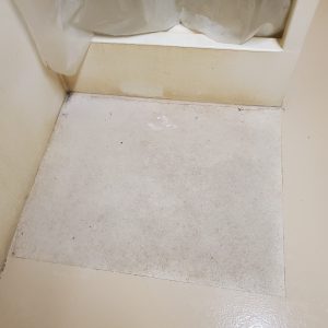 Non slip shower coating for detention center